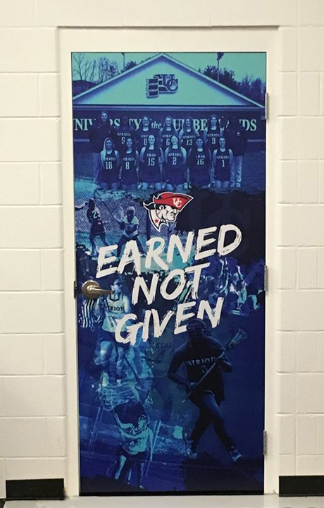 Wall graphics can be used on doors! UC Lacrosse Door Graphic